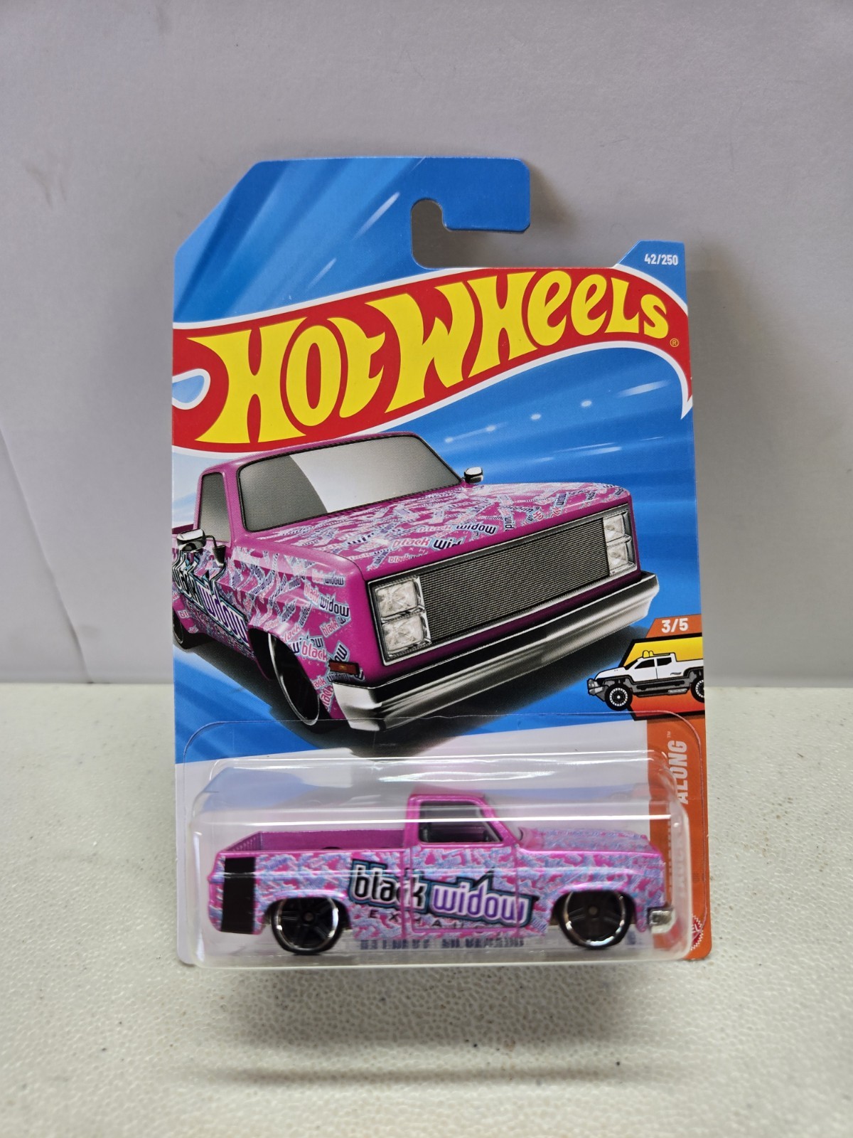 Hot Wheels HW Hot Trucks ’83 Chevy Silverado Black Widow Pink 1:64 Diecast