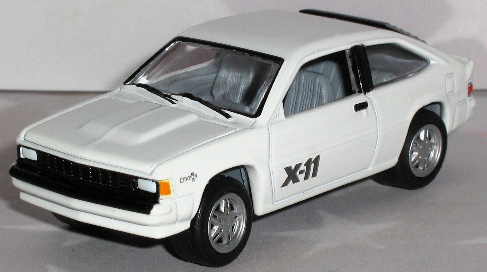 1/64 = 1988 85 CHEVY CITATION X-11 / Rubber Tire Compact Car / FREE SHIPPING