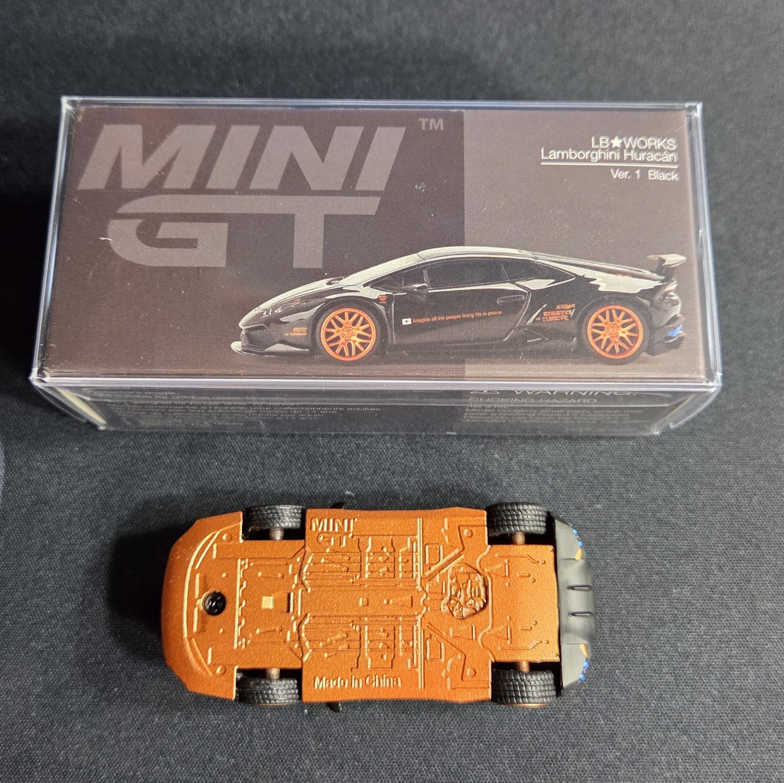 Mini GT #234 CHASE – LB Works Lamborghini Huracan Black & Bronze – See Photos