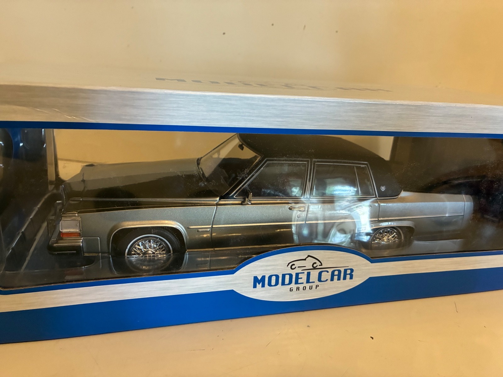 MCG 1982 Cadillac Fleetwood Brougham Grey Metallic 1:18 new in box box damaged
