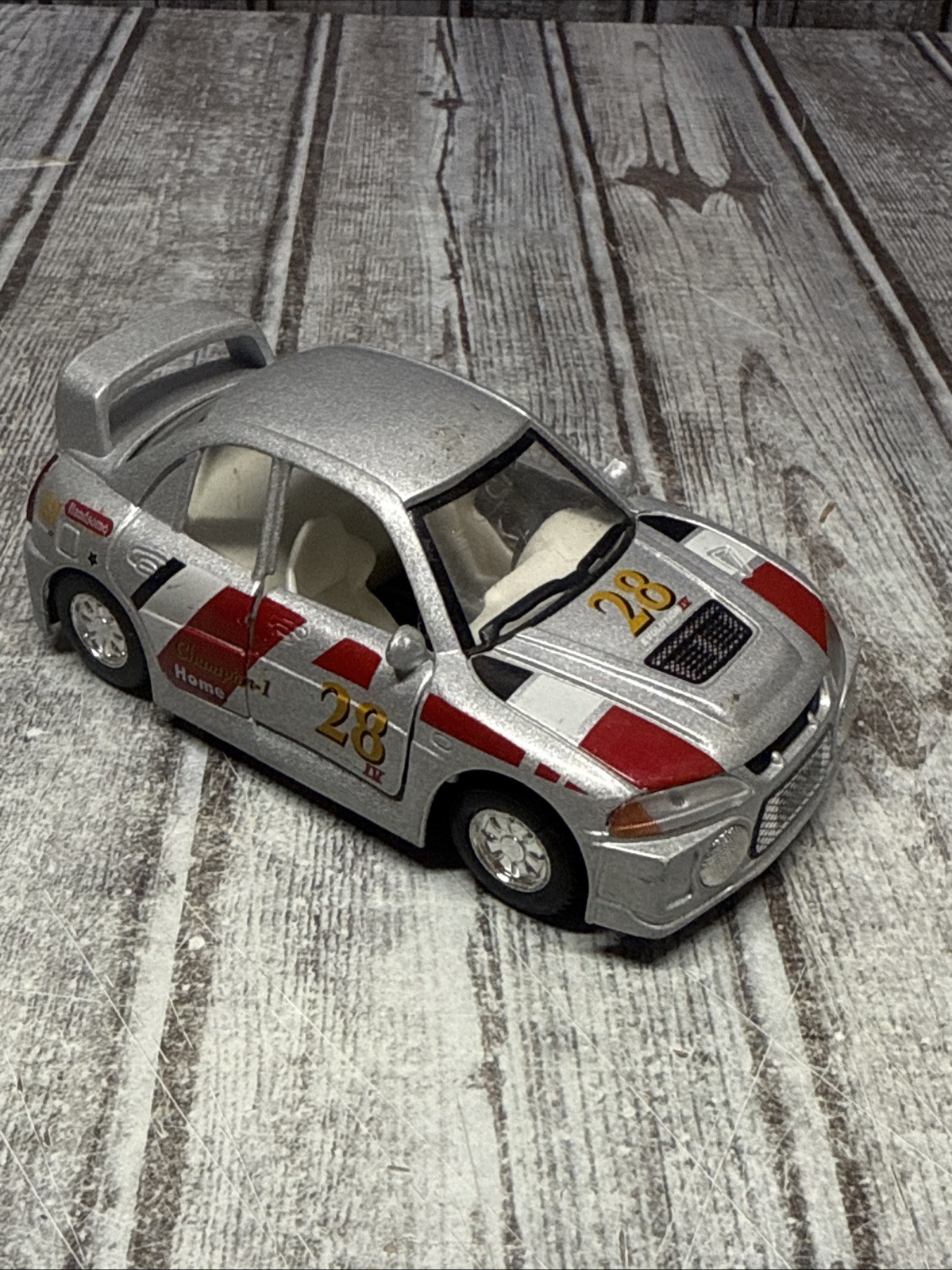 Kintoy Racing Silver Mitsubishi Evolution IV Toy Car Pull Back Die Cast 1:41