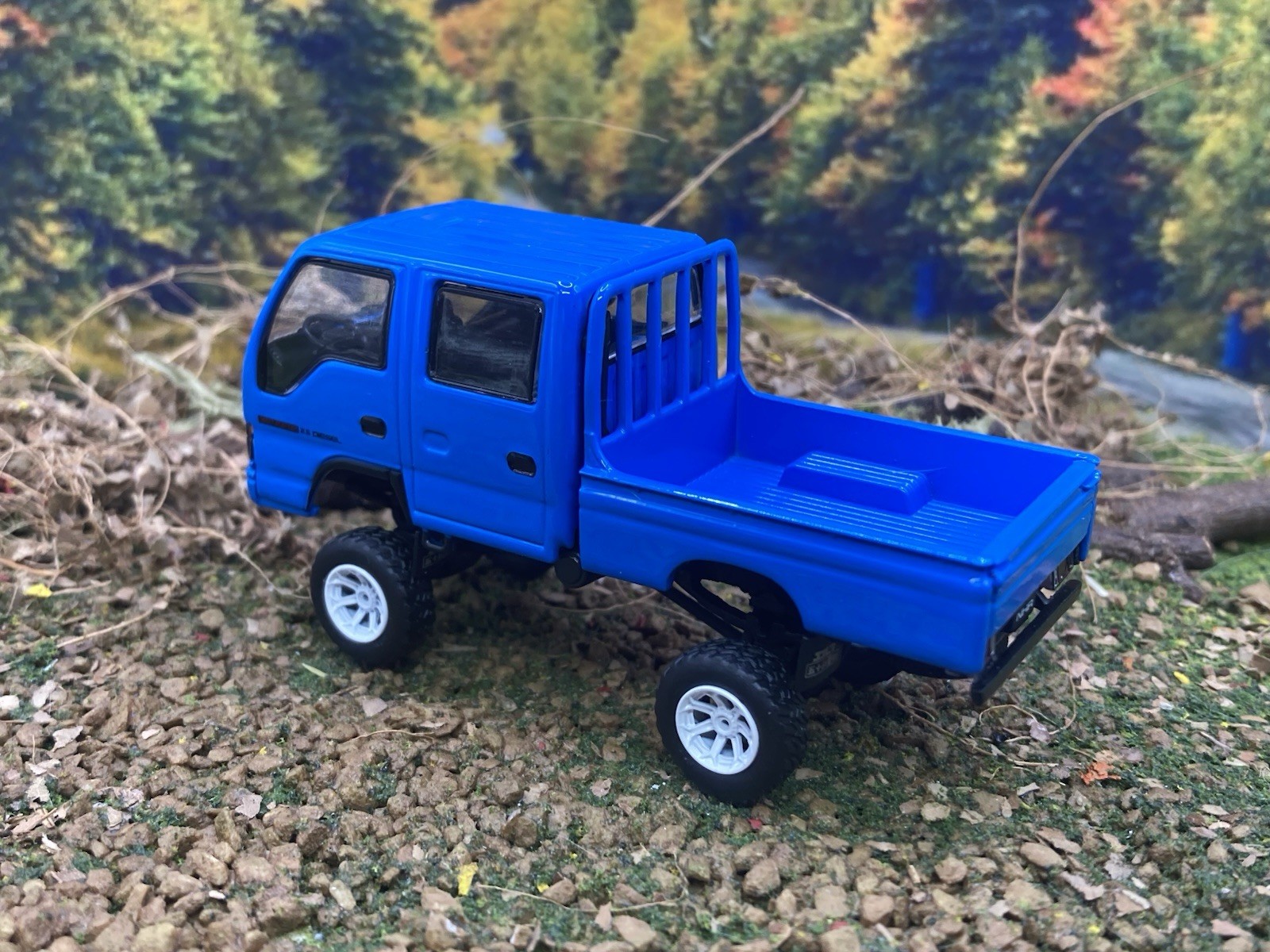 Isuzu NHR Lifted 4×4 Pickup Truck 1/64 Scale Massdi Diecast Custom Model1