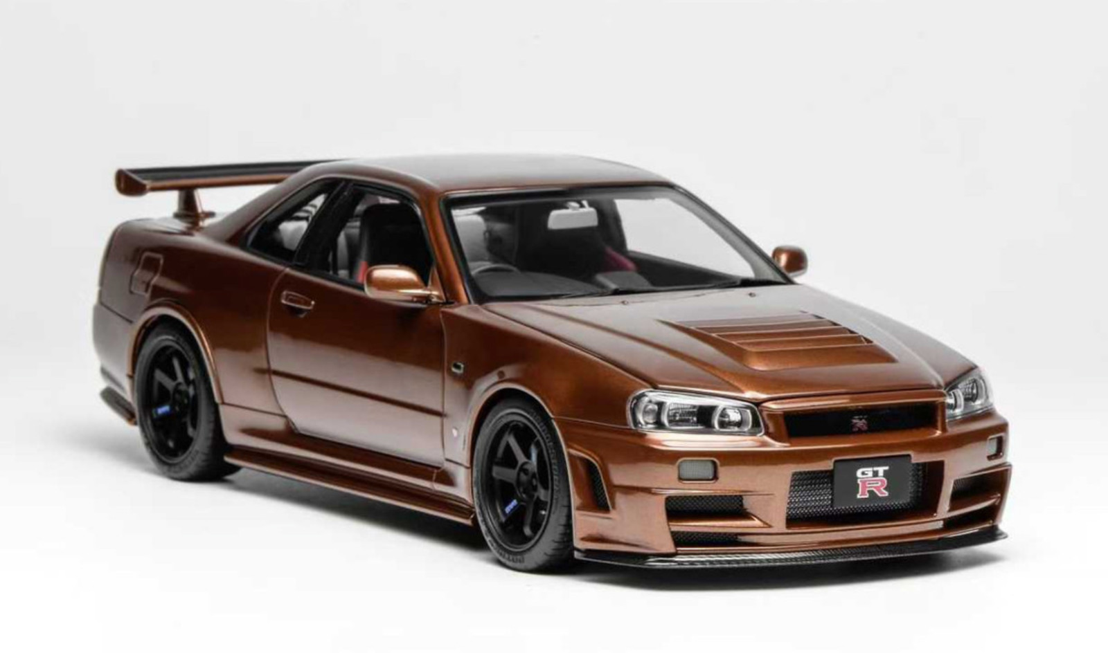 1/18 Motorhelix Nissan Skyline GT-R R34 in Metallic Bronze