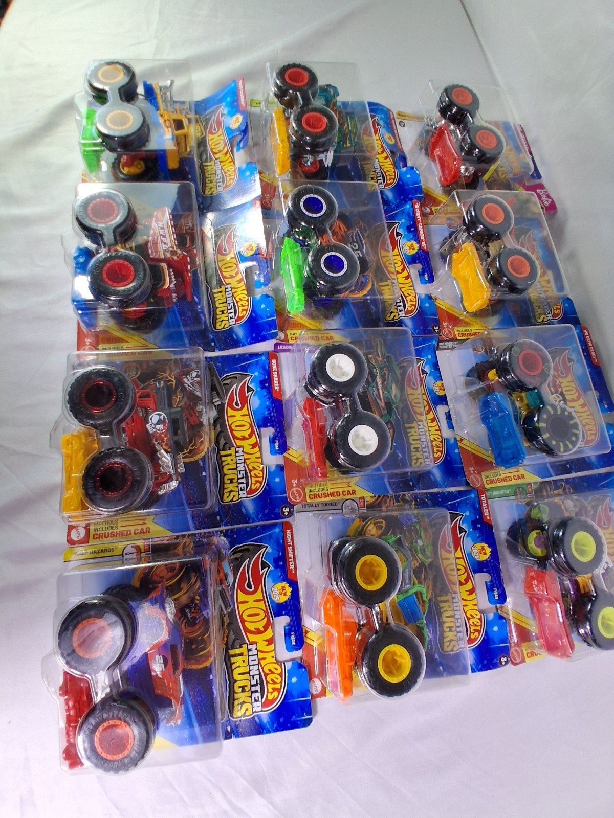 Lot of 12 Hot Wheels Monster Trucks Sealed Bone Shaker Fire Dept Camaro SS…