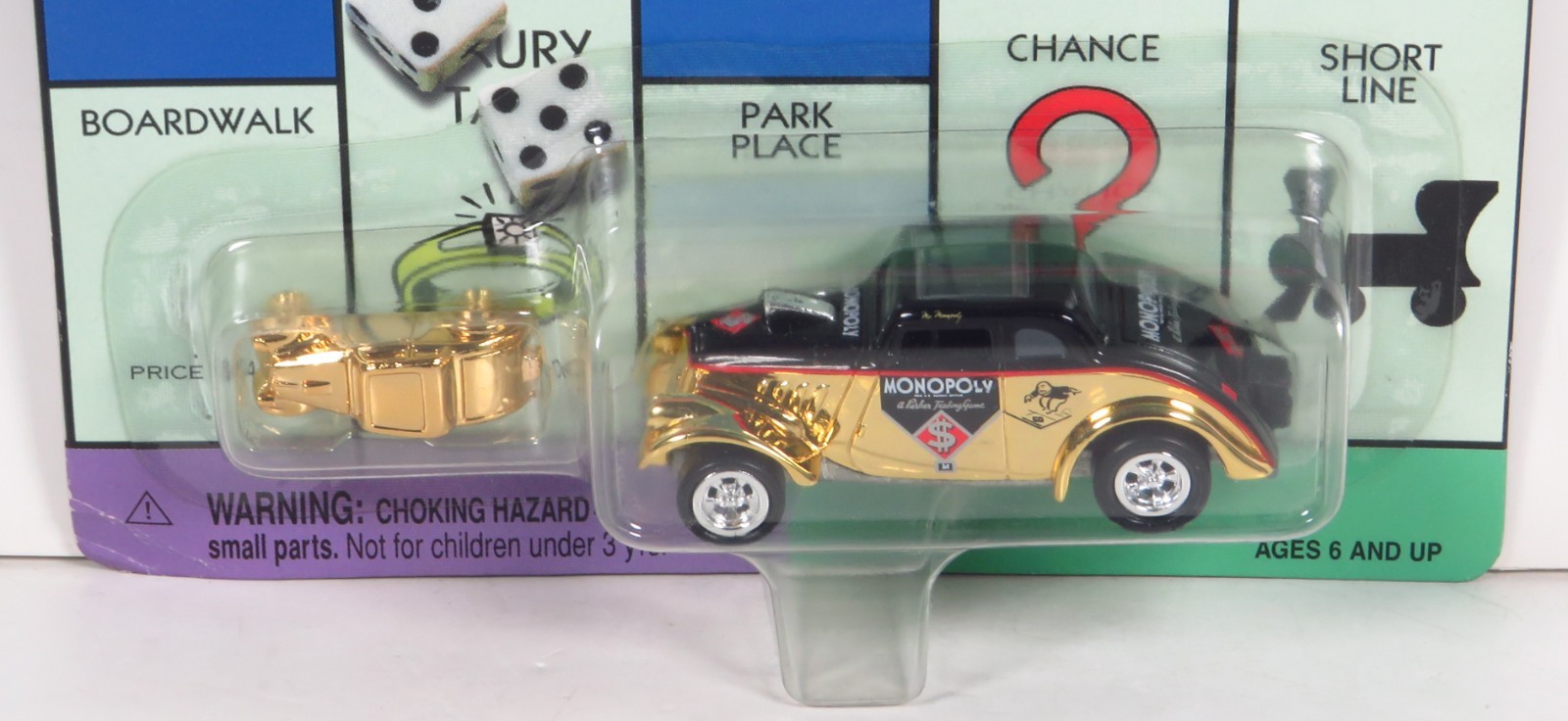 JOHNNY LIGHTNING Monopoly Vintage 1933 Willys Coupe 33 Gold Diecast KB Toys 1:64