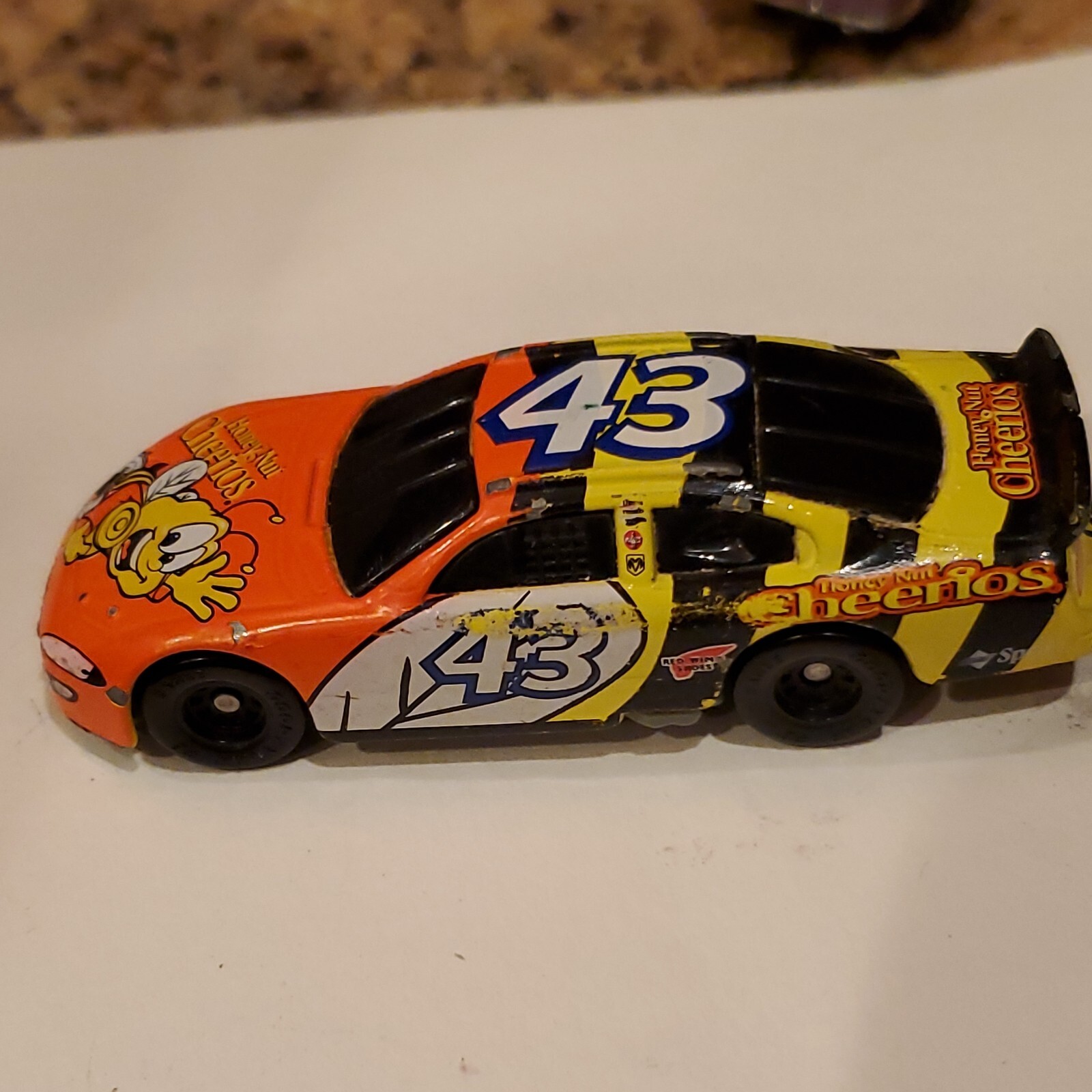 Hot Wheels Honey Nut Cheerios #43 Race Car. Please see photos of actual item for