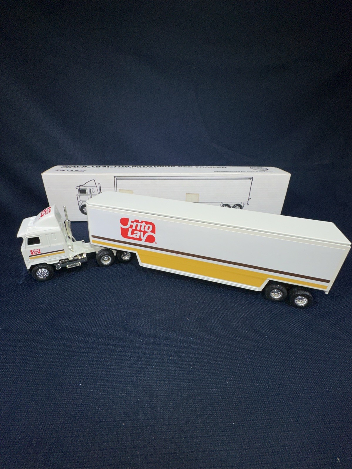 Ertl Frito Lay MACK Cabover Tractor with Drop Bed Trailer 1/64 Diecast NIB