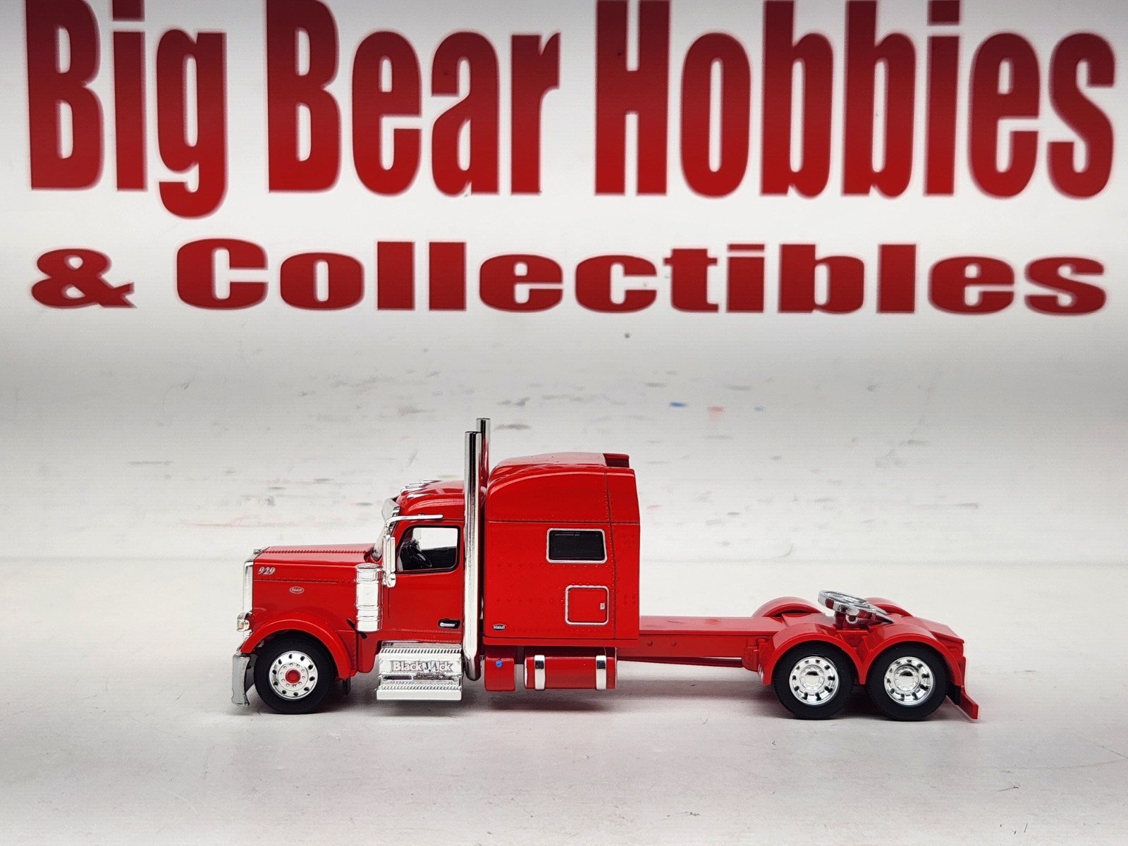 1/64 New DCP Red 589 Peterbilt 70″ Midroof Sleeper Blackjack