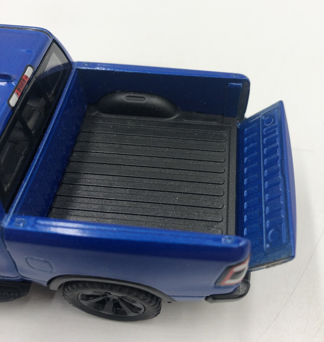 2 Kintoy Die Cast Dodge Ram 1500 Die Cast Red and Blue