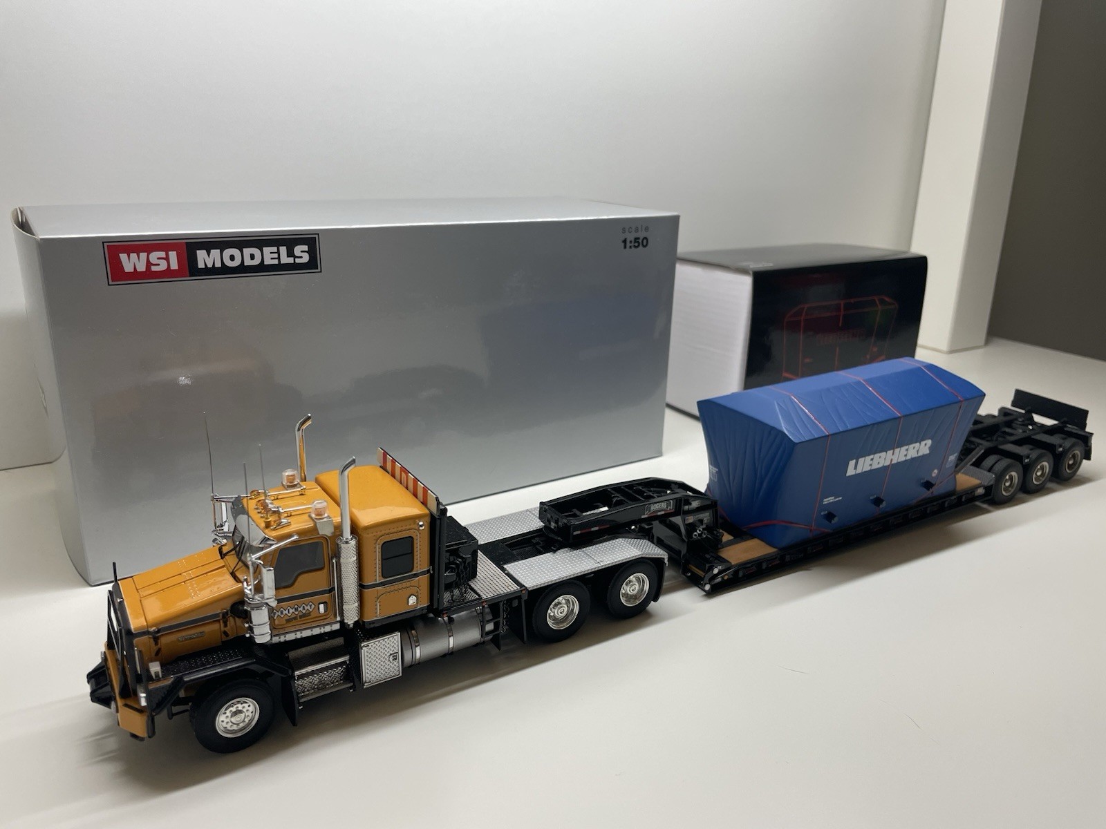 WSI 1/50 Kenworth C500 Premay W/ballest Box, Black Rodgers Low Boy, IMC Load