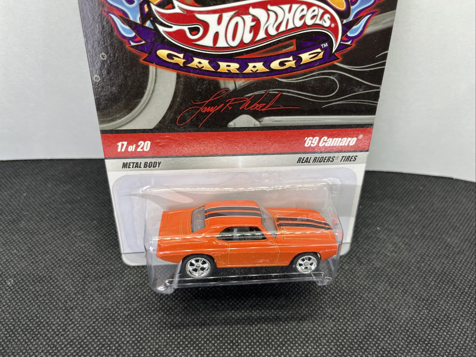 HOT WHEELS – LARRY’S GARAGE – 1969 CHEVROLET CAMARO ORANGE – REAL RIDERS