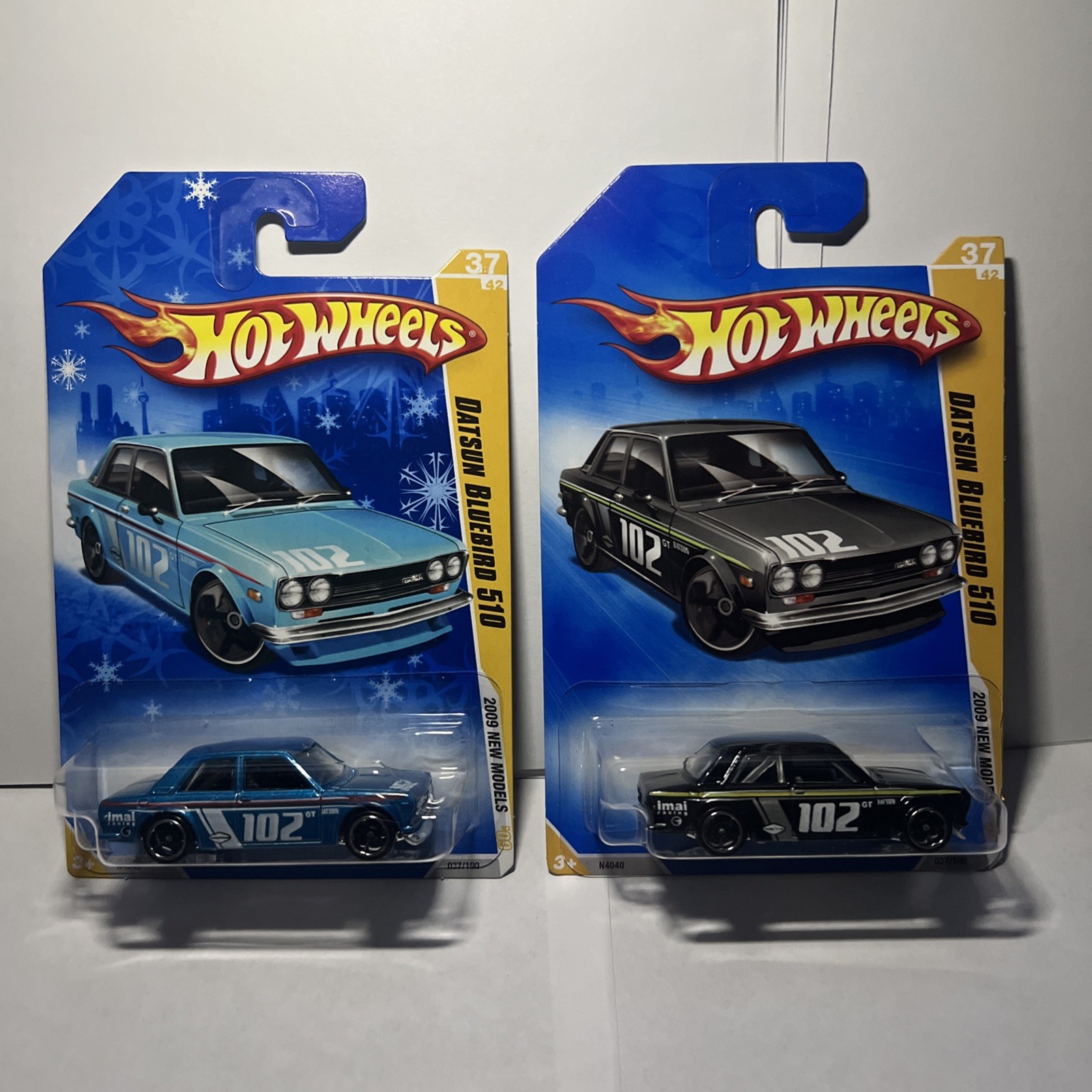 Hot Wheels 2009 Datson Bluebird 510 lot Blue + Black New Model ￼