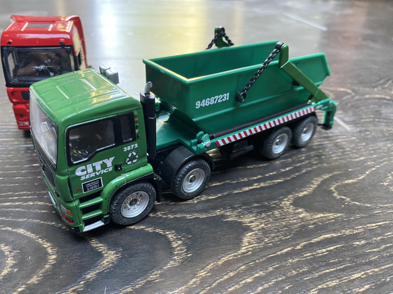 Action City REALTOY City MAN Skip Truck Dumpster & a MAN Racing Team Unit