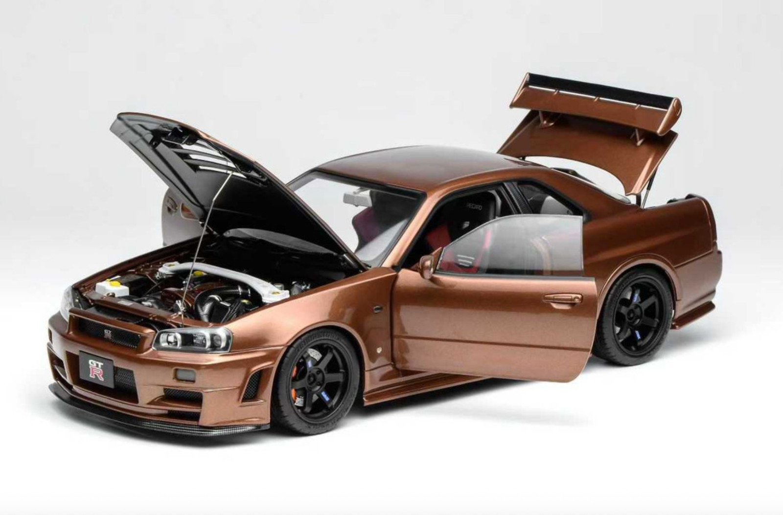 1/18 Motorhelix Nissan Skyline GT-R R34 in Metallic Bronze