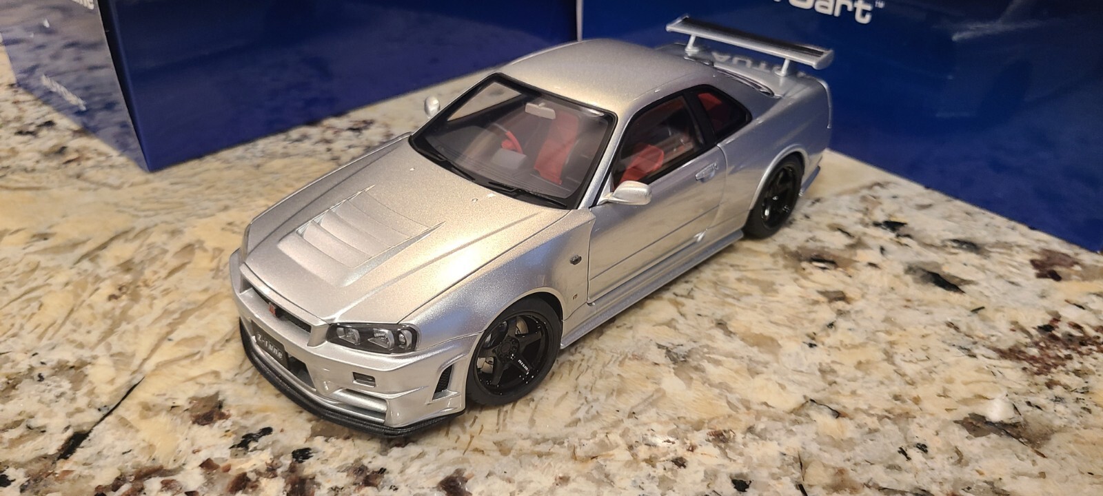 Nissan Skyline GT-R (R34) Z-Tune, Z-Tune Silver in 1:18 scale by AUTOart 77461