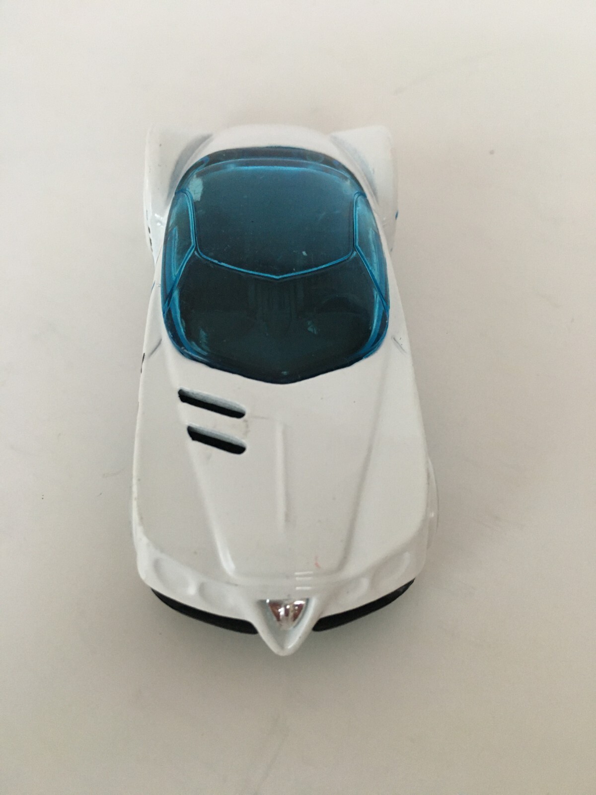 Hot Wheels Golden Arrow Toy Car White with Light Blue and Black Stripes 2016