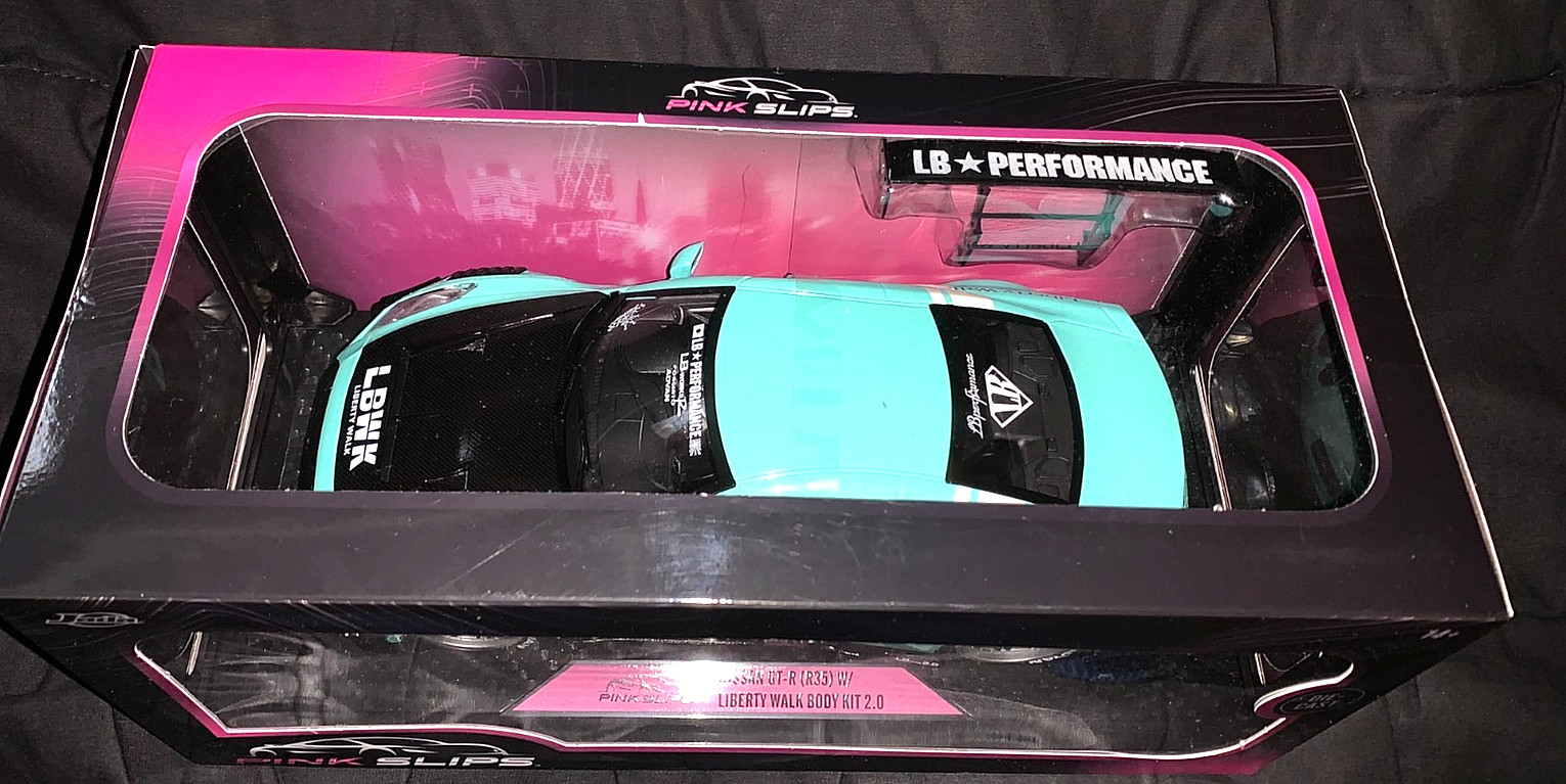 JADA 2025 1/18 DIECAST PINK SLIPS TEAL NISSAN GT-R (R35) W/LIBERTY WALK BODY KIT