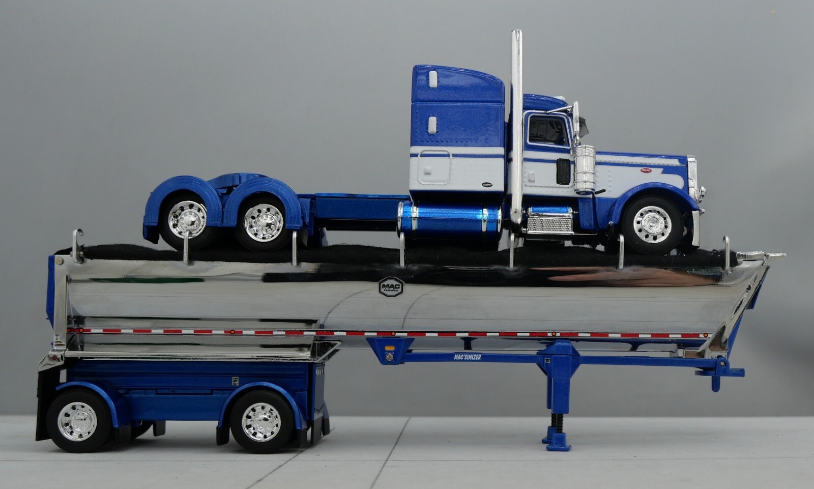 DCP 1/64 Blue White Peterbilt 389 Mac Spread Axle Round Dump Trailer 60-1740