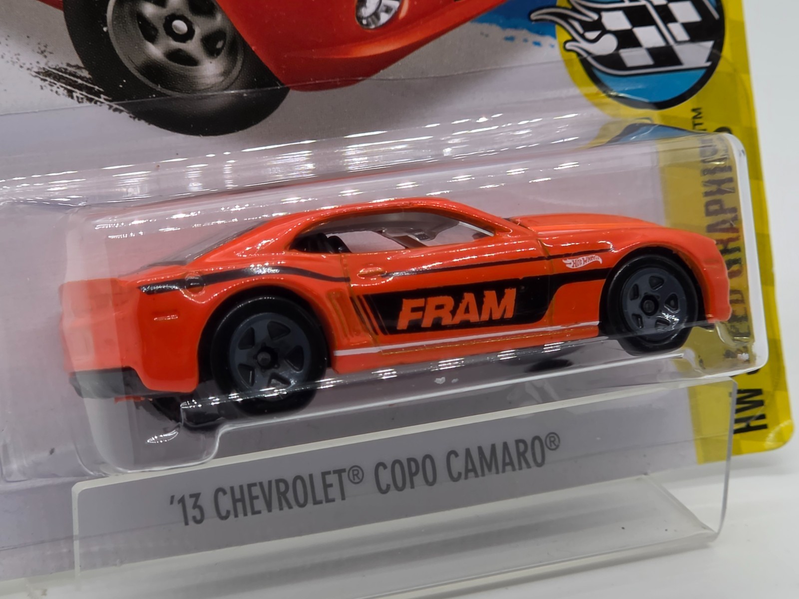 Hot Wheels ’13 Chevrolet COPO Camaro FRAM Orange Speed Graphics 4/10 Sealed