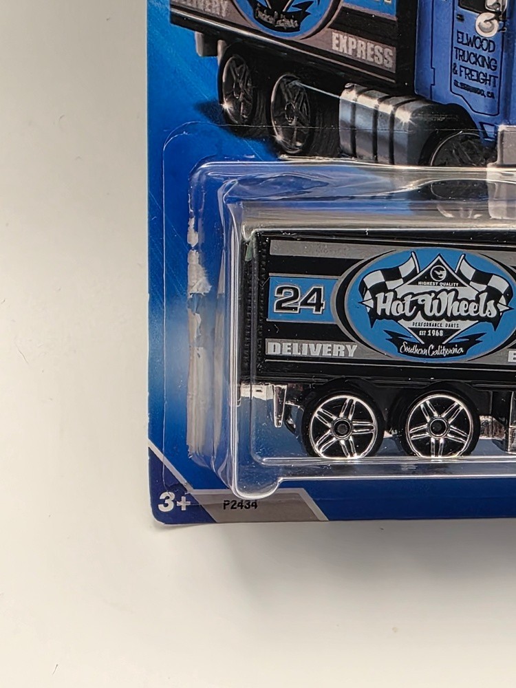 HOT WHEELS 2009 HW CITY WORKS 8/10 – HIWAY HAULER BLUE AND BLACK (WN) (TOTE 4)