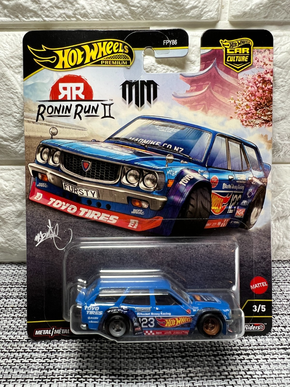 Hot Wheels Premium Ronin Run II 3/5 Mad Mike Mazda RX-3 Wagon/Remorque Blue