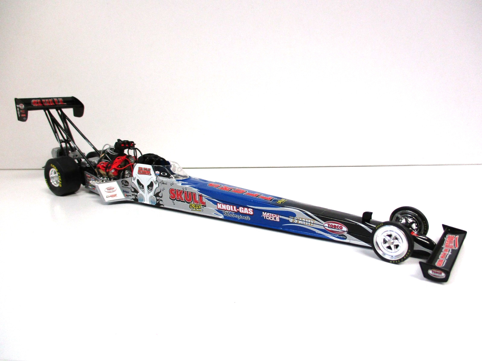 ACTION – MELANIE TROXEL SKULL GEAR TORCO 2006 NHRA TOP FUEL DRAGSTER 1/24