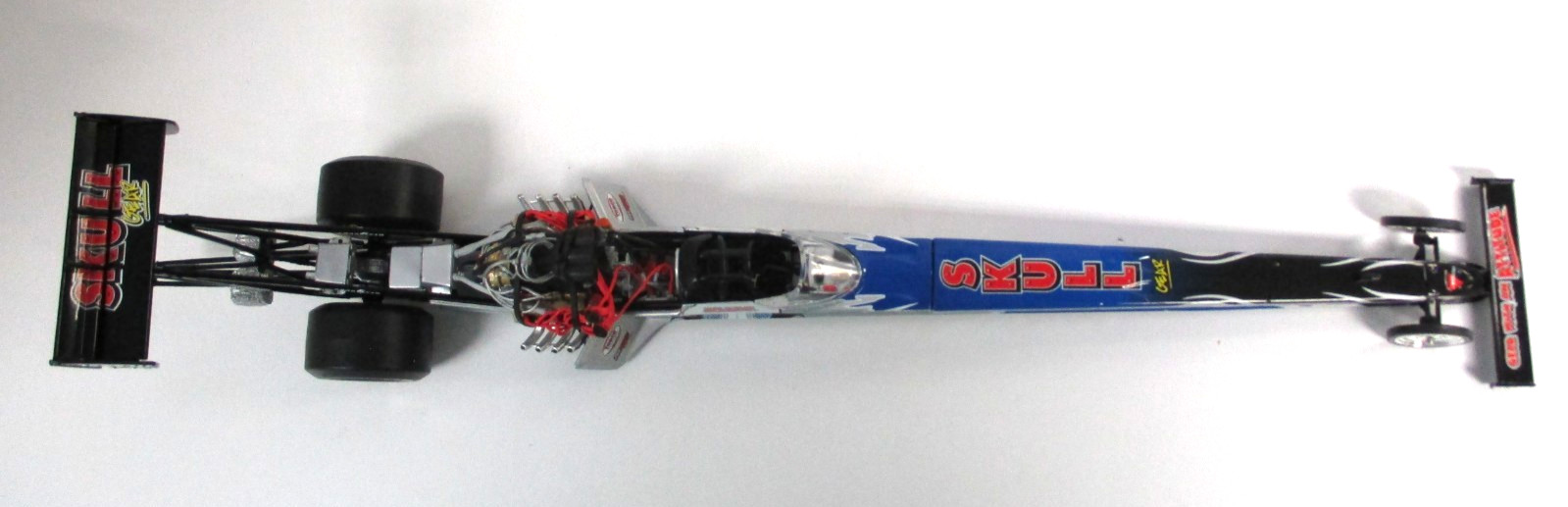 ACTION – MELANIE TROXEL SKULL GEAR TORCO 2006 NHRA TOP FUEL DRAGSTER 1/24