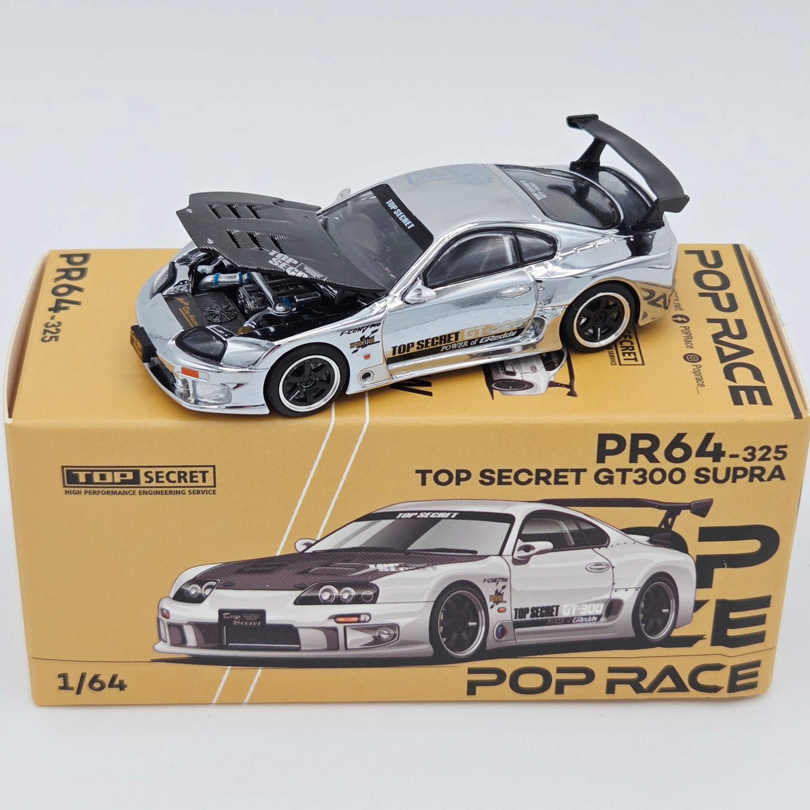 Pop Race Top Secret Toyota GT300 Supra – 1:64, Silver Chrome (2026)