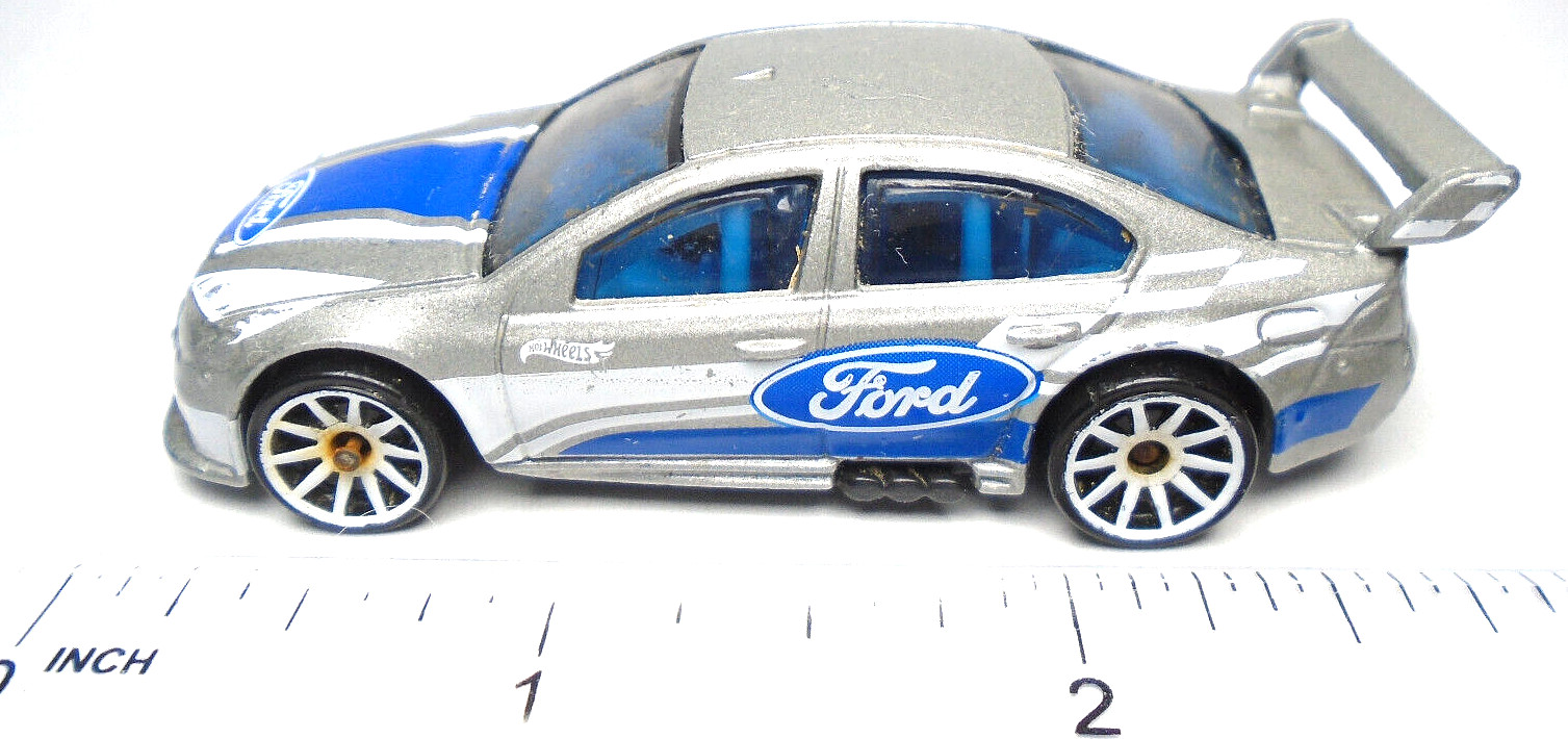 2021 HOT WHEELS FORD FALCON SILVER 1:64 DIECAST 3″ RACE CAR WITH BLUE & WHITE
