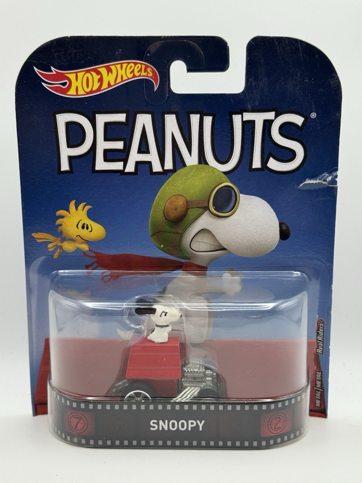 Hot Wheels Peanuts Snoopy – 1:64 Diecast Car Real Riders (READ)