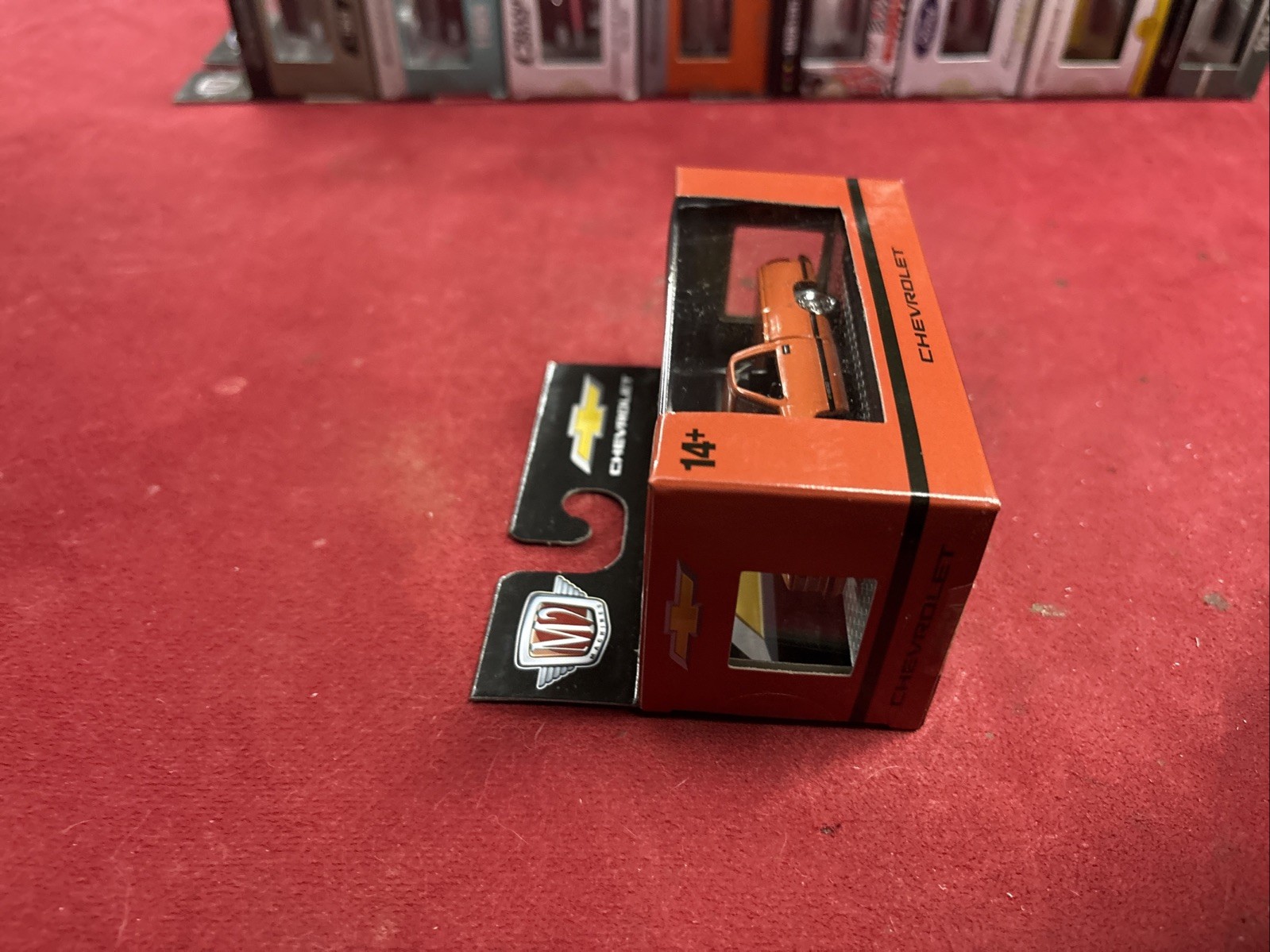 M2 Machines Chevrolet Orange Diecast Pickup Truck 1:64 Scale 14+ Years Boxed
