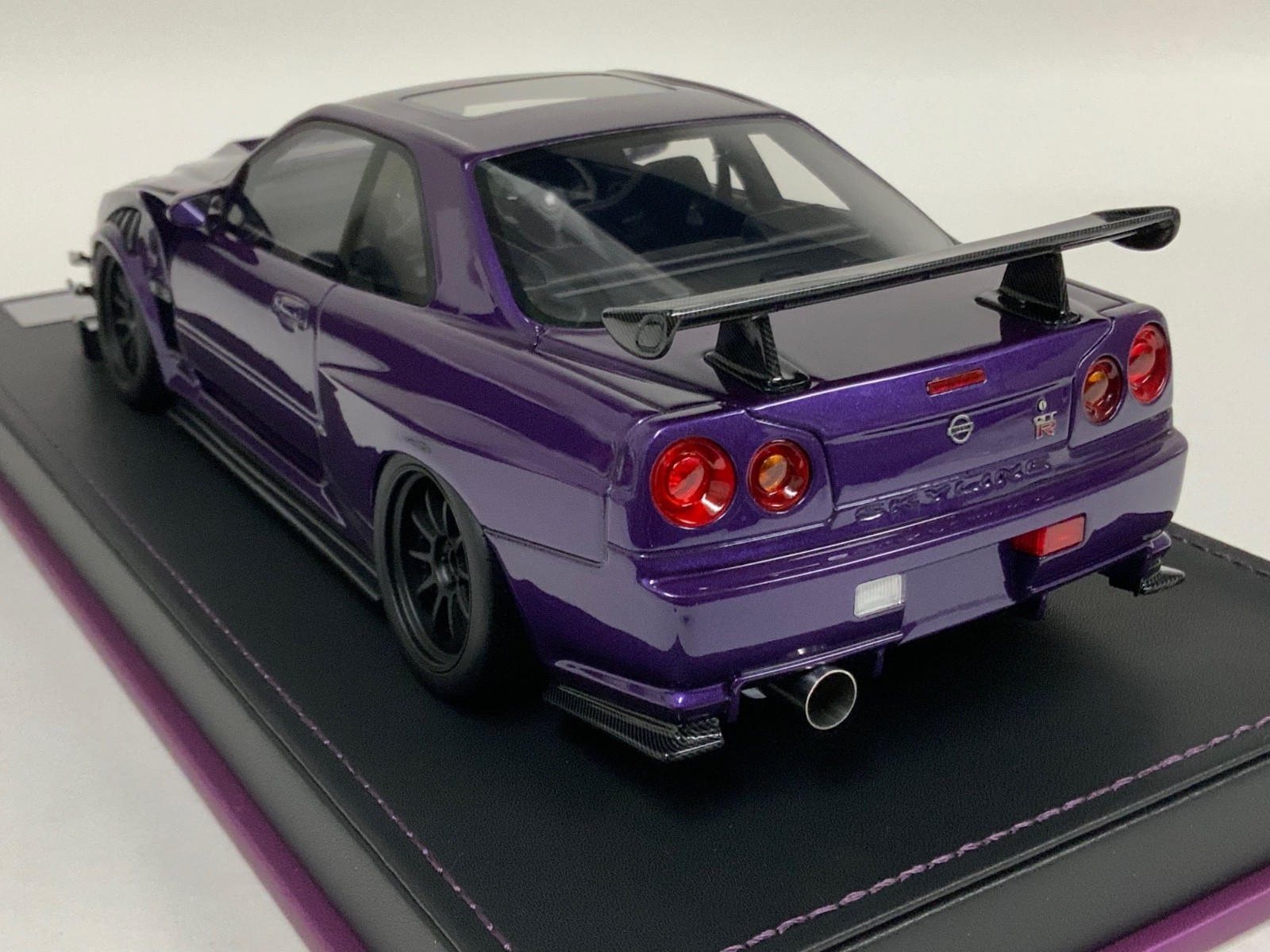 1/18 IVY Nissan R34 customized with Full Engine Purple leather base 20 pieces