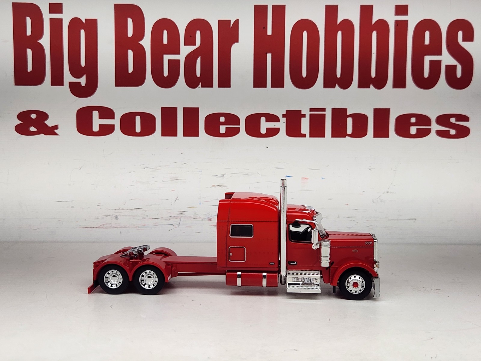 1/64 New DCP Red 589 Peterbilt 70″ Midroof Sleeper Blackjack