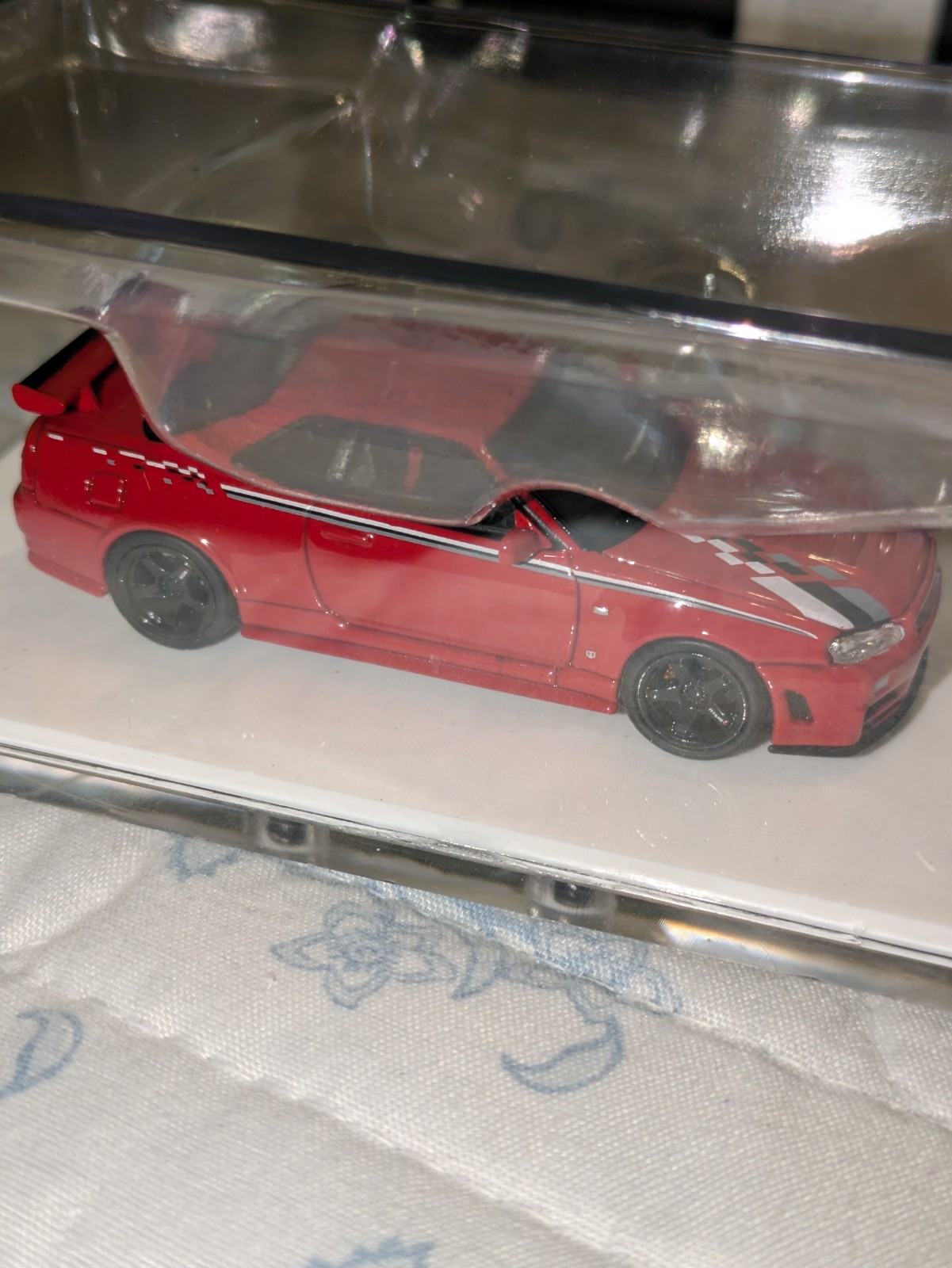 Motorhelix Nissan R34 Red 1;64 Diecast