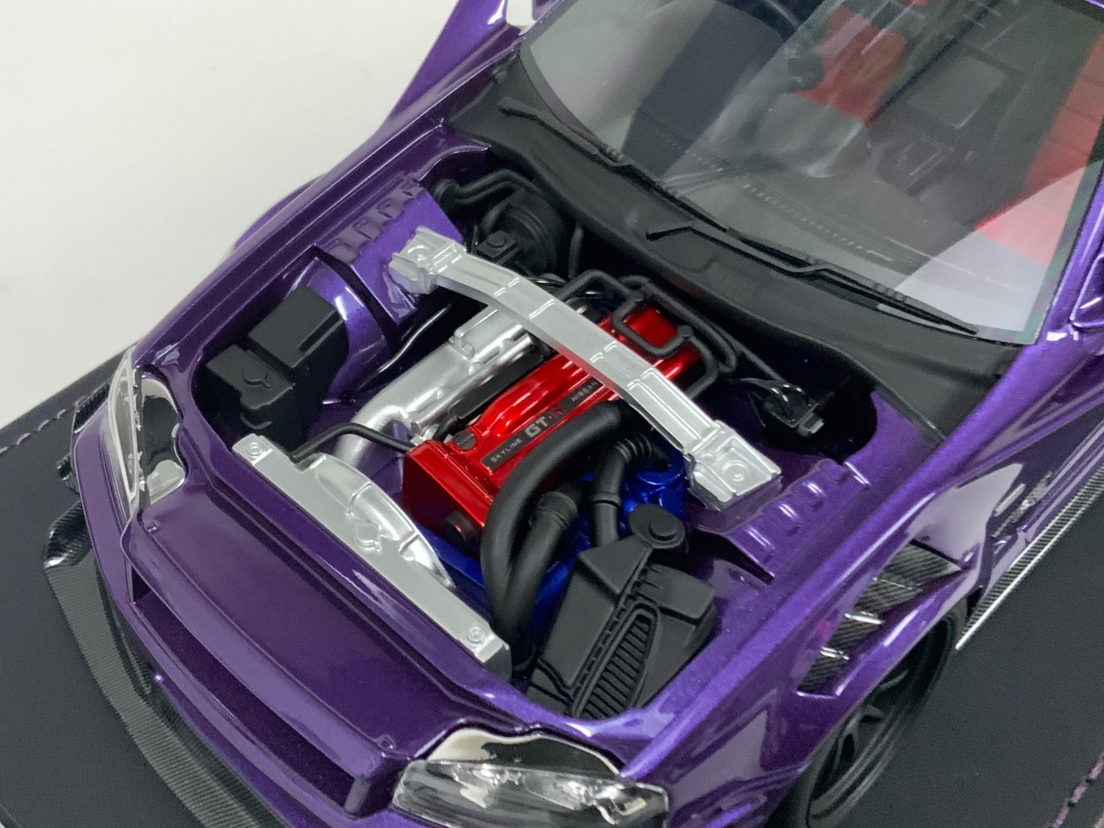 1/18 IVY Nissan R34 customized with Full Engine Purple leather base 20 pieces