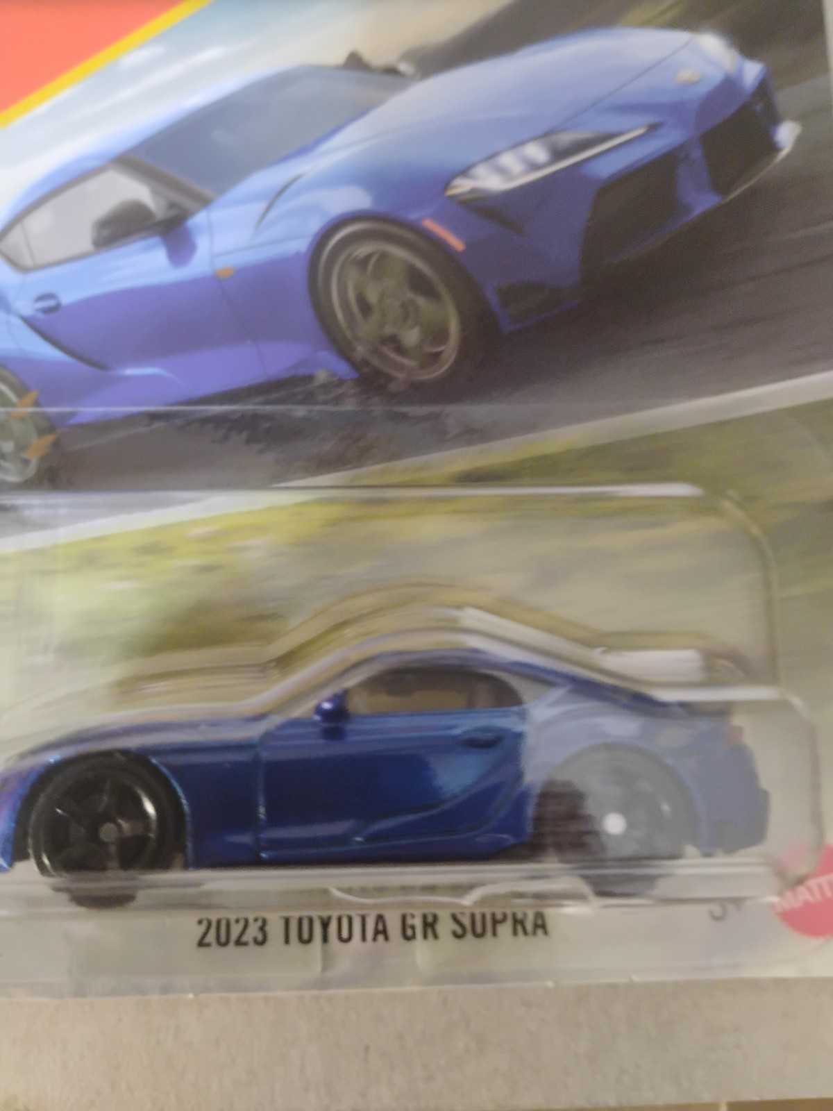 Blue And Yellow 2023 Toyota Gr Supra Matchbox 164 Scale