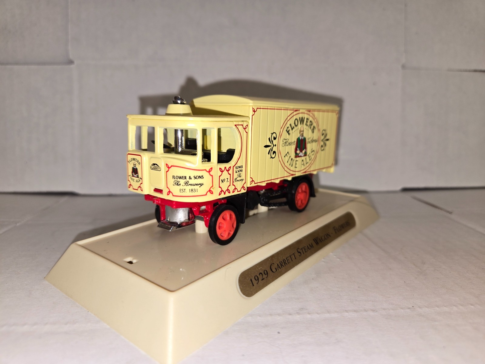 MATCHBOX 1929 GARRETT STEAM WAGON FLOWERS FINE ALES DELIVERY TRUCK WITH STAND