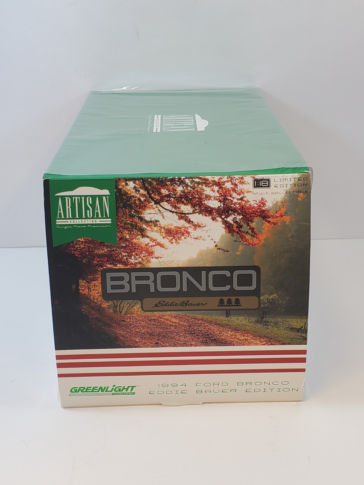 Greenlight 1994 Ford Bronco Eddie Bauer Edition Electric Red & Bronze 1/18