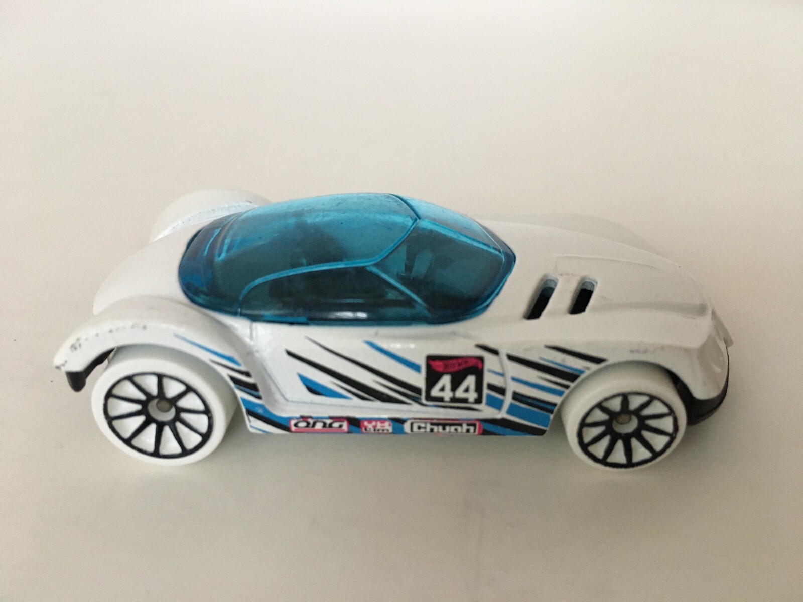 Hot Wheels Golden Arrow Toy Car White with Light Blue and Black Stripes 2016