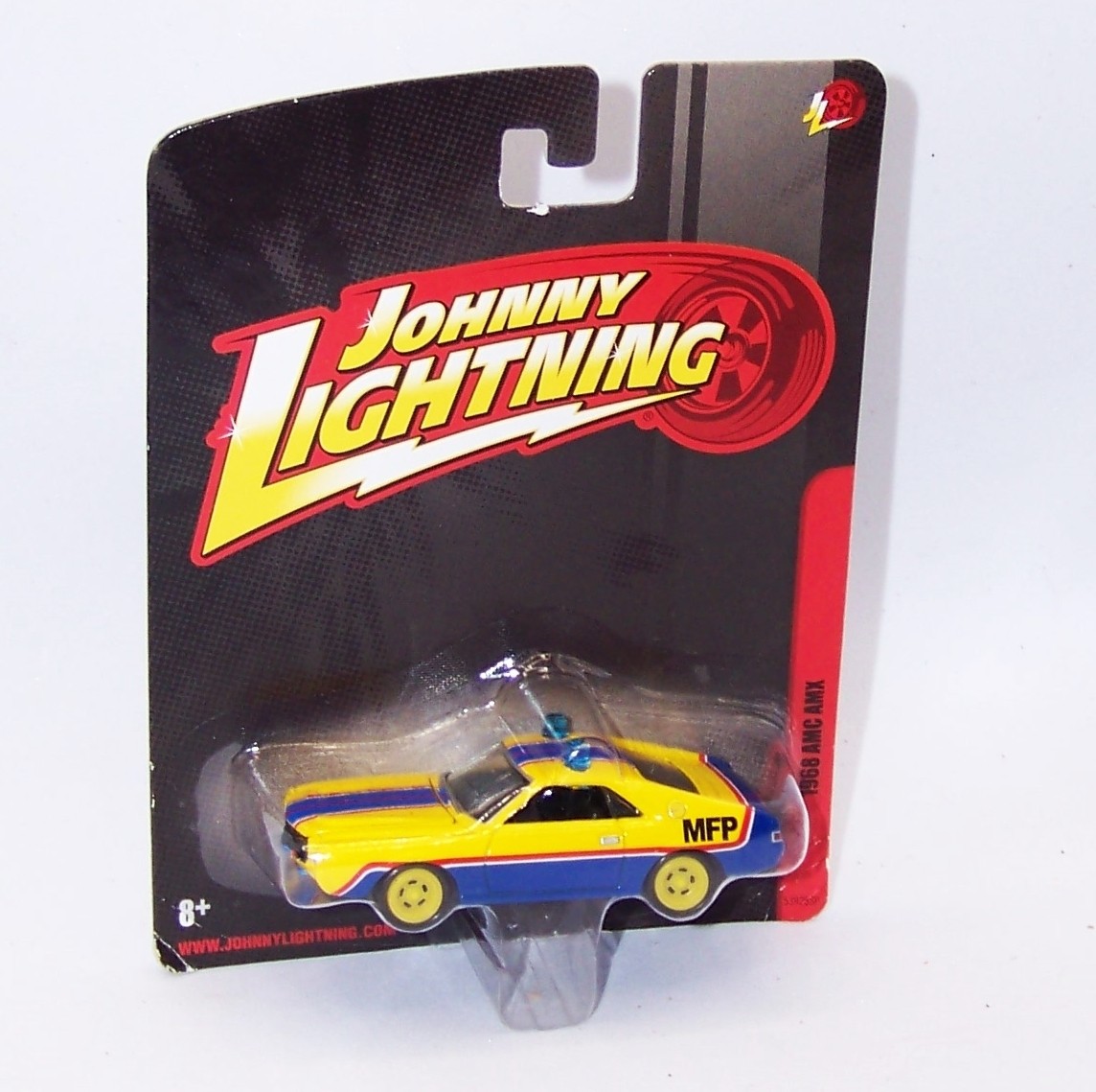 1:64 2010 JOHNNY LIGHTNING 1968 AMC AMX MFP MAIN FORCE PATROL MAD MAX NIP