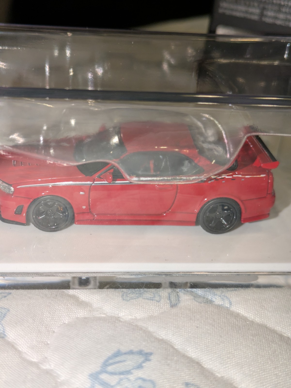 Motorhelix Nissan R34 Red 1;64 Diecast