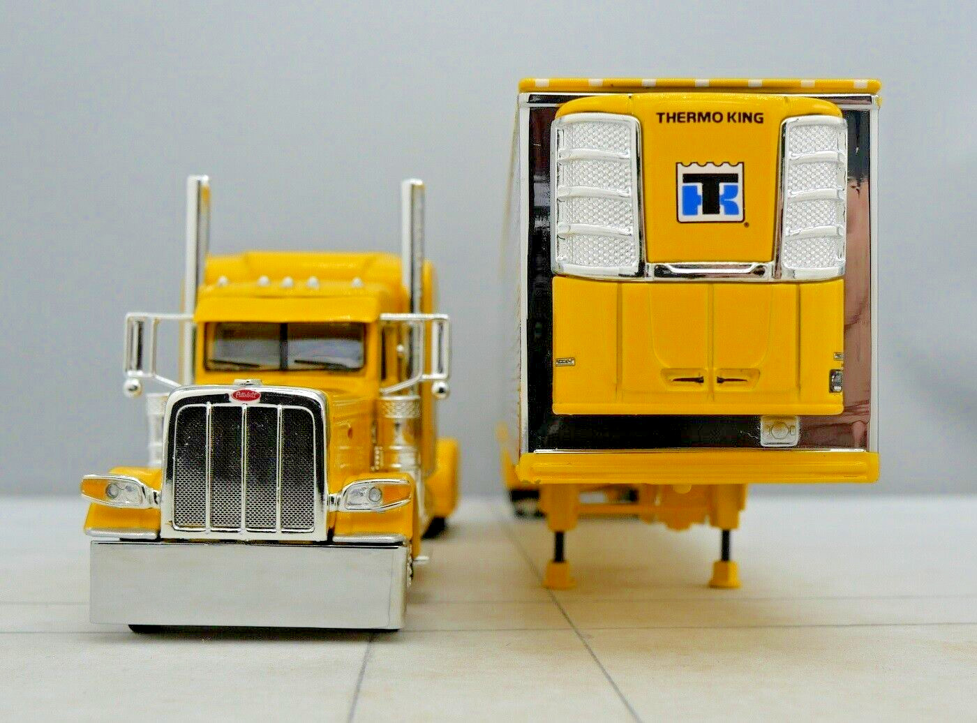 DCP 1/64 Yellow Chrome Peterbilt 389 Utility Refrigerated Trailer 60-1733