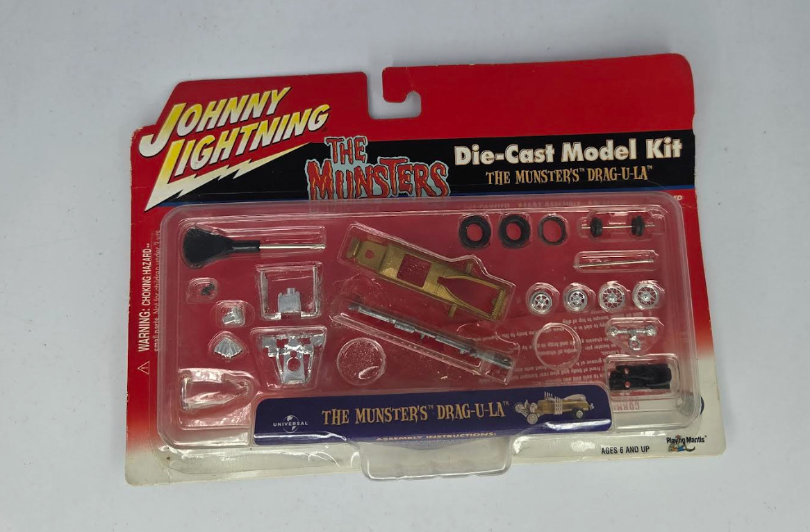 Johnny Lightning The Munsters Drag-U-La Diecast Model Kit Sealed Universal 1999