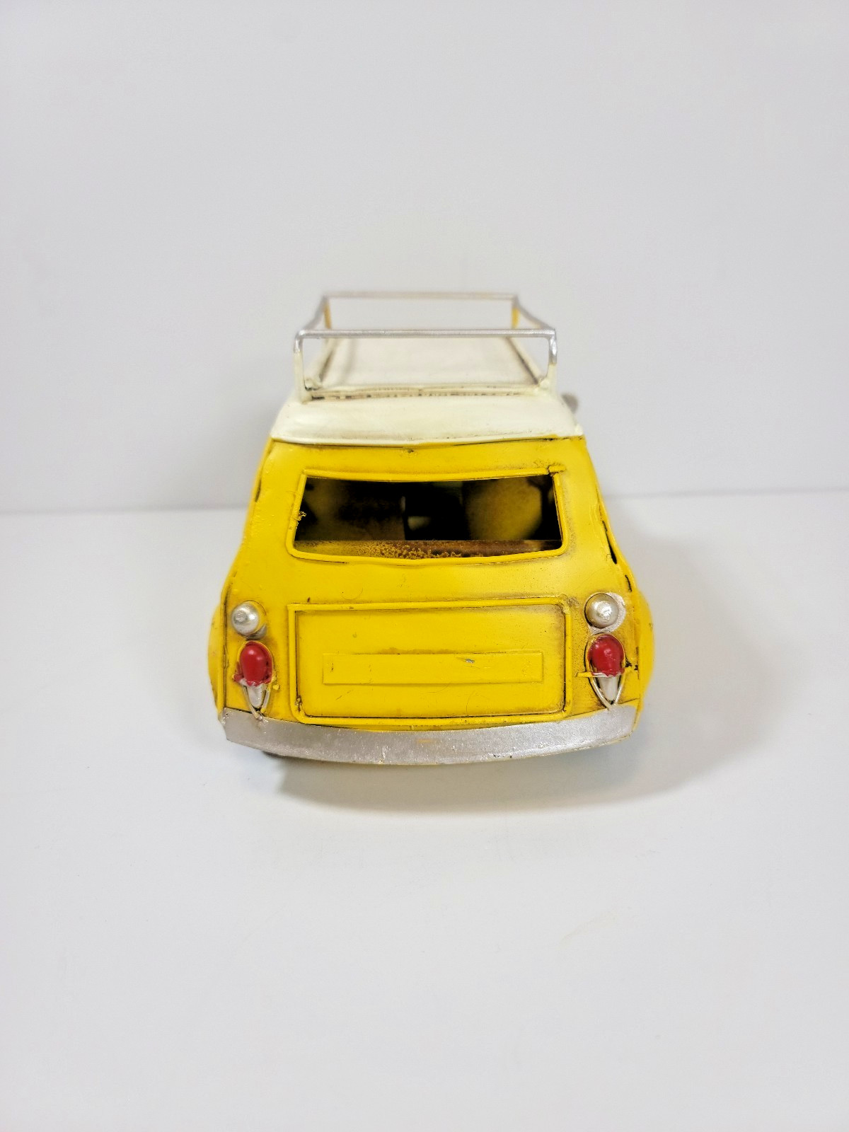 The Spring Shop Yellow Metal Mini Car with Sunflowers – Distressed Vintage Decor