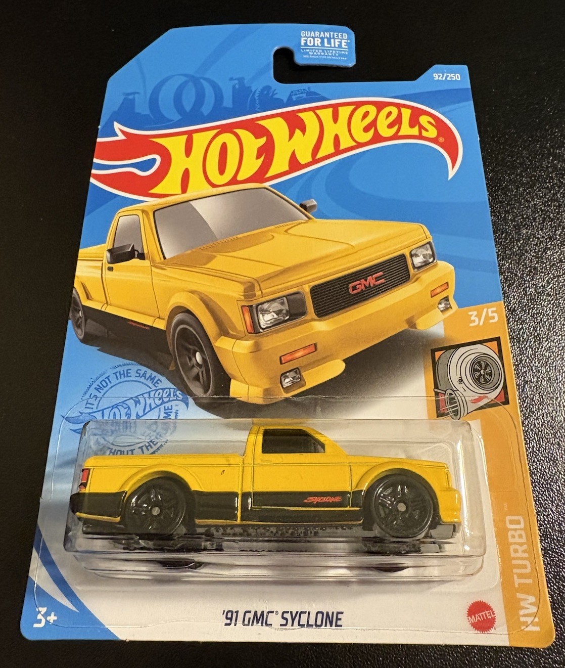 Hot Wheels Kroger 2021 Yellow ‘91 GMC Syclone in Protector HW Turbo 3/5 #92/250