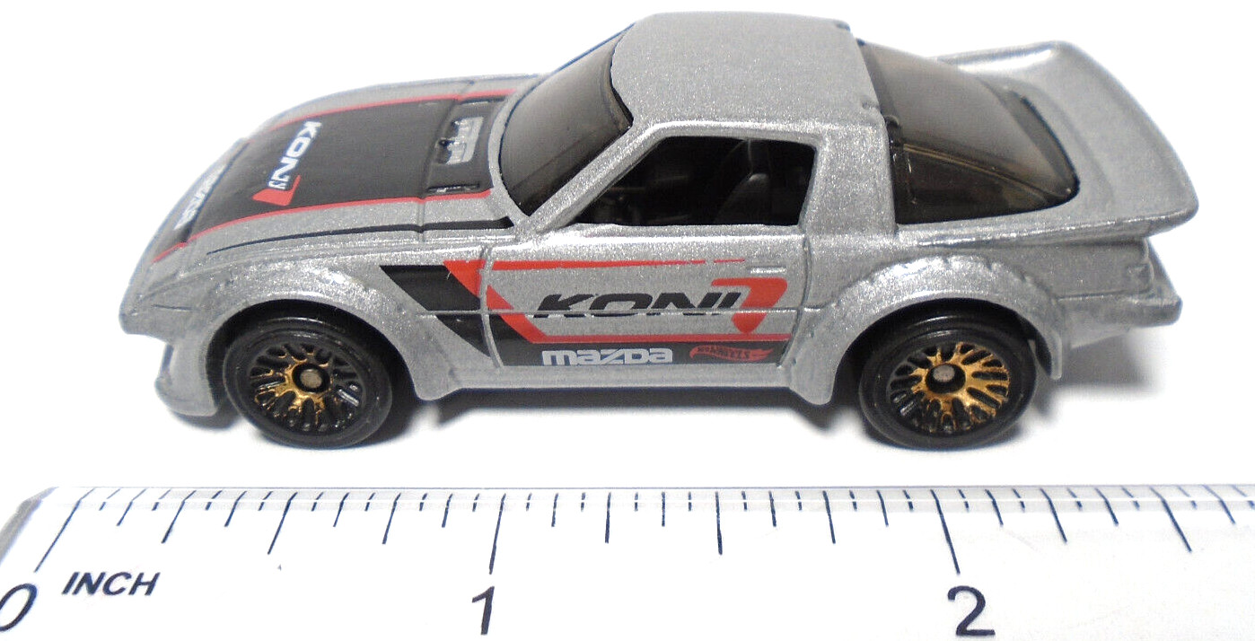 2011 HOT WHEELS MAZDA RX-7 KONI SILVER 2 5/8″ DIECAST RACE CAR WITH BLACK & RED