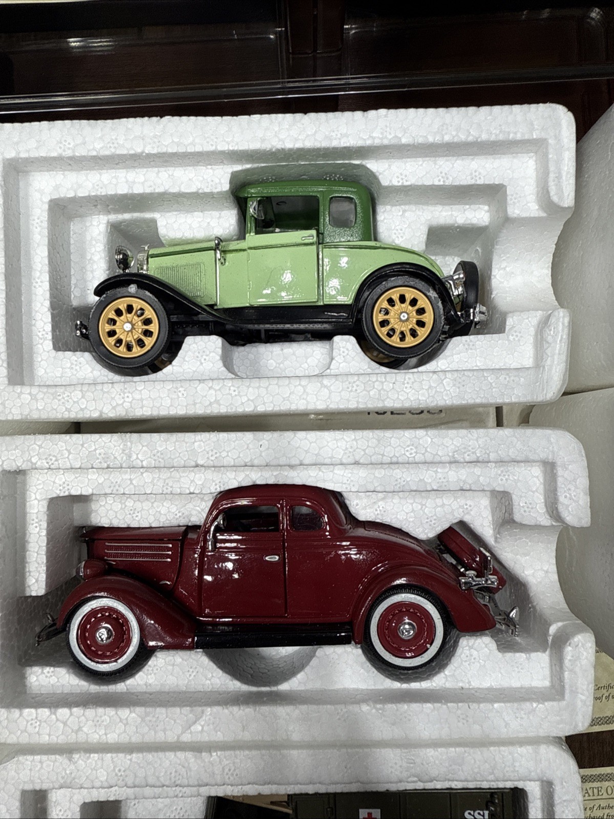 Lot Of 12 NATIONAL MOTOR MUSEUM MINT CARS WITH DISPLAY STAND