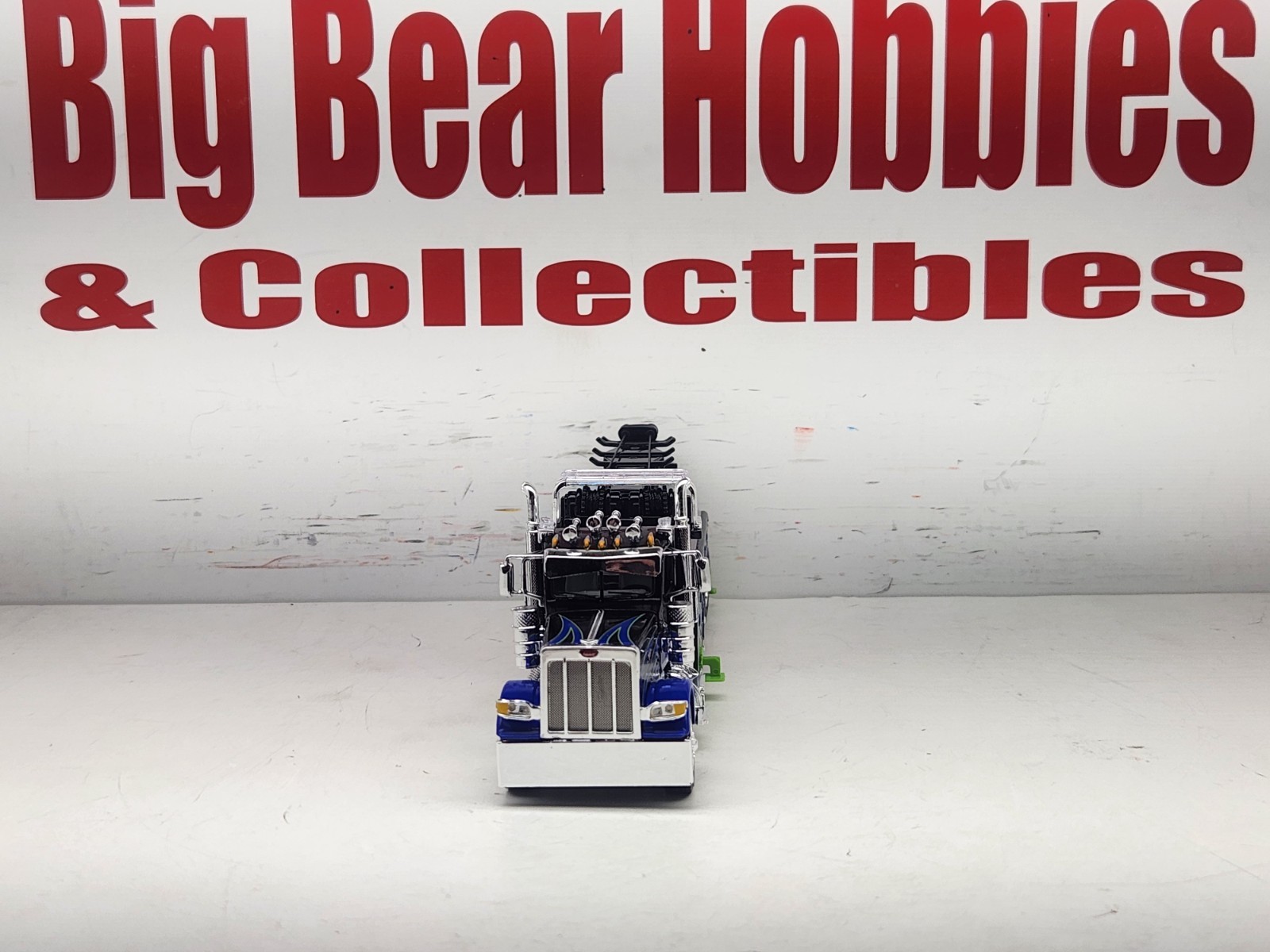 1/64 DCP/FG #60-2248 Black, Blue, & Green 389 DC Peterbilt Century 1150 Rotator