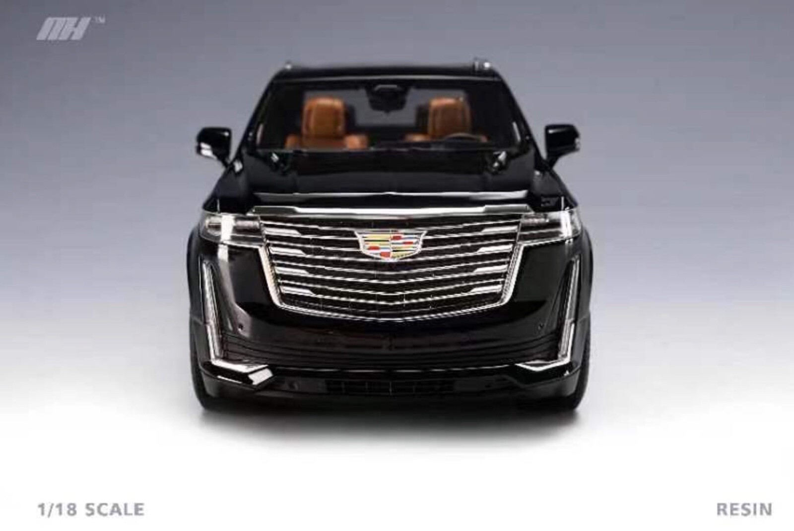 1/18 Motorhelix Cadillac Escalade 2022 in Gloss Black on Carbon Base