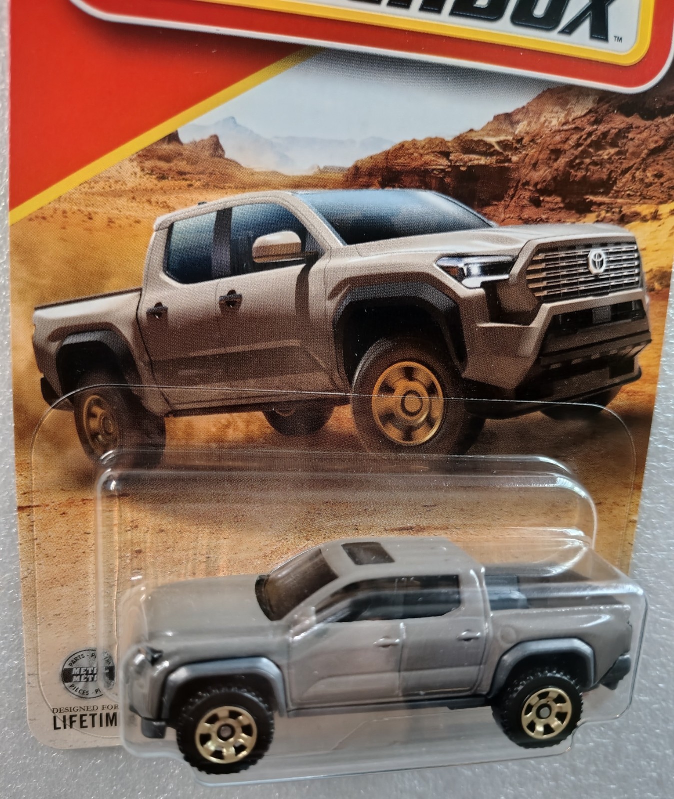 2024 Toyota Tacoma Pickup Light Brown #43/125 Matchbox ’26 diecast licensed card
